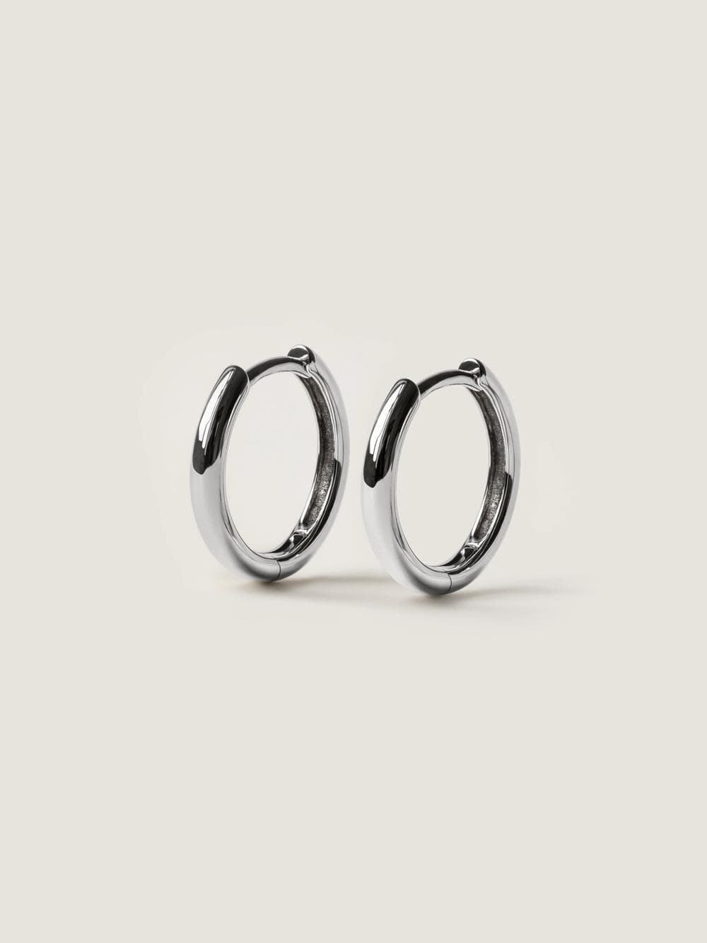Huggie Hoop Earrings in white gold