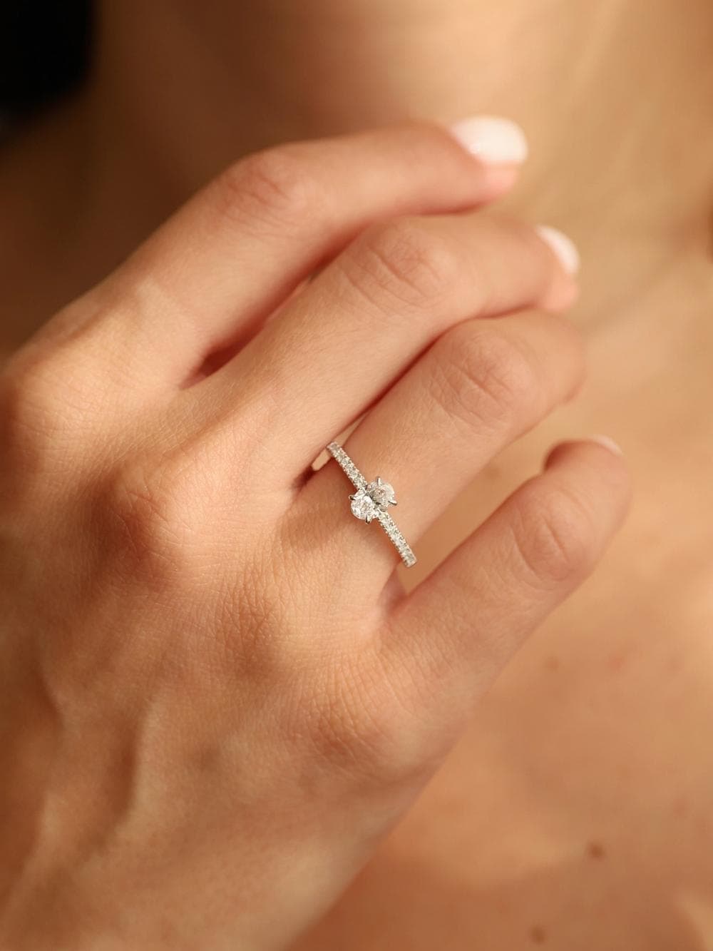 Pavé Oval Cut Ring on hand white gold